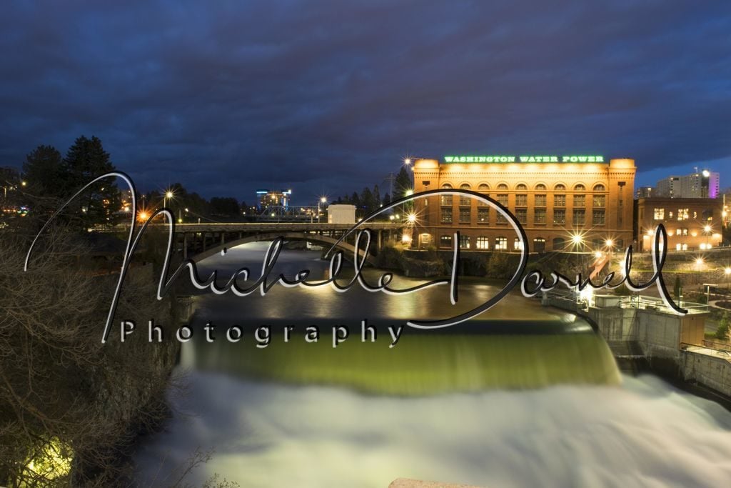The Post Street Bridge and the Washington Water Power building, with the Red Lion Hotel and the Riverfront Park Pavilion in the background. 72 dpi, 300 dpi, 600 dpi