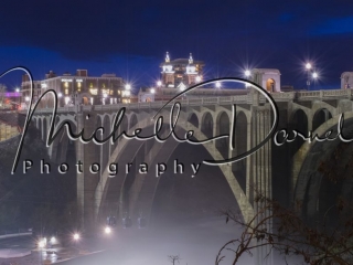 The Monroe Street bridge looms over the Spokane Falls gondola ride at night in downtown Spokane, Washington. 72 dpi, 300 dpi, 600 dpi